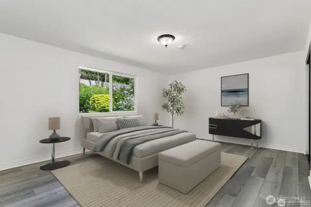 Large primary bedroom with eastern facing windows