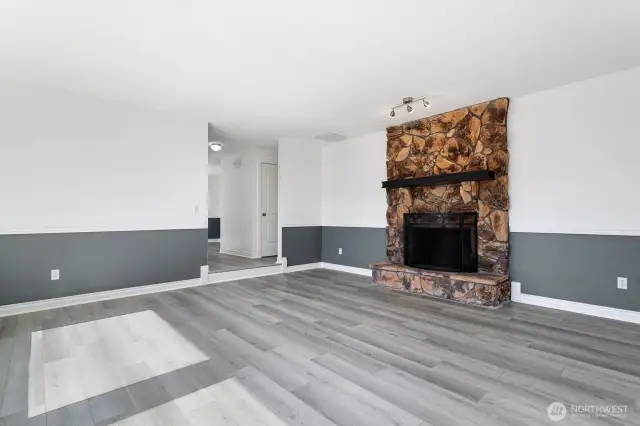 Inside you’ll be welcomed by a sunken formal living room