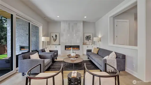 The light finishes and the natural light from the expansive sliding door give this living space a light & bright feel.