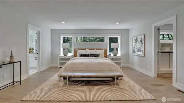 More of the gorgeous hardwood flooring, ample natural light, walk-in closet & spacious en-suite; perfect primary sanctuary.