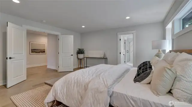 The primary suite is extra roomy with a ton of natural light and a double door entry.