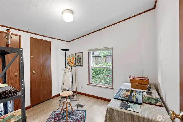 Bedroom 3, currently used as an art studio.