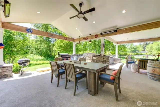 There are 3 outdoor separate covered areas. This one has large table area and outdoor kitchen area.