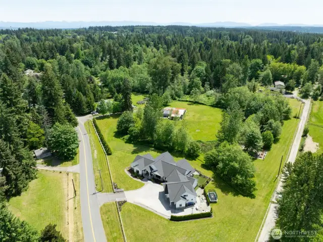Nice aerial view of the 3.86 Acre site. Beautiful area. Private setting, but still a close-in location.