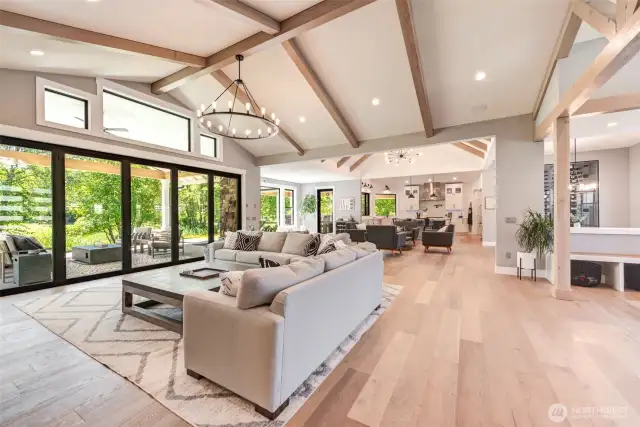 Great angle of the main living area. The accordion doors open completely for great indoor/outdoor living space. The high ceiling & upper windows provide lots of light.
