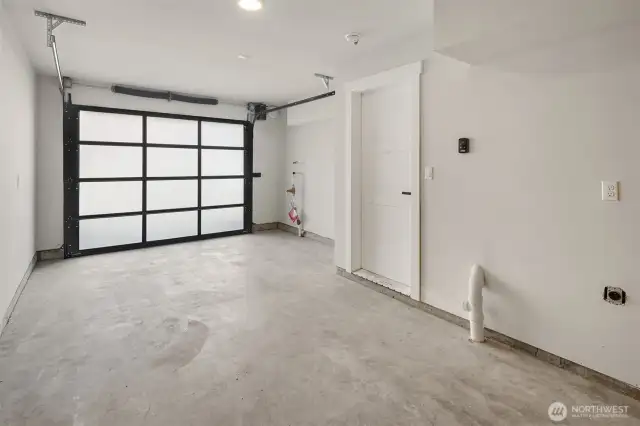 Well-planned nook for garbage and recycling bins.