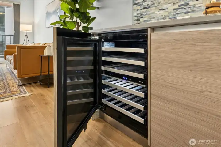 The Thermador beverage fridge on the buffet/bar.