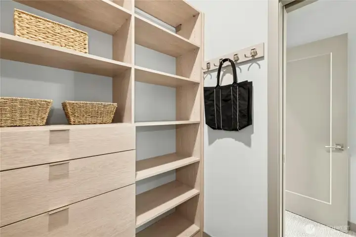 The walk-in closet in the primary suite.