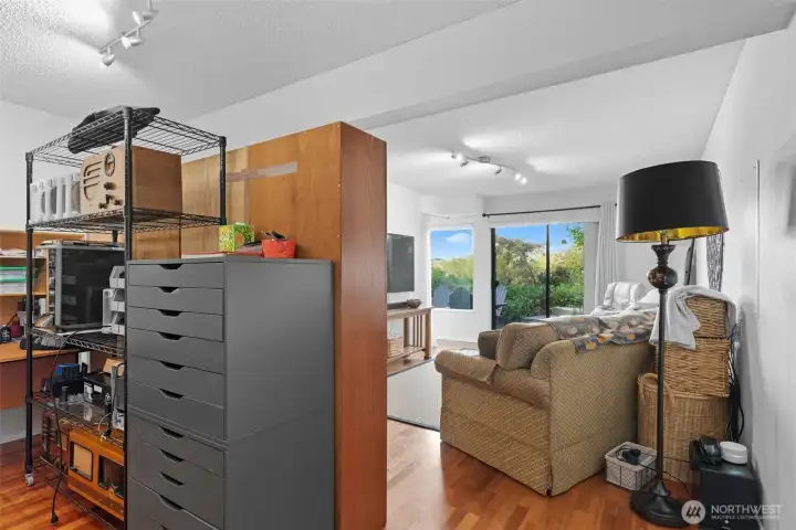 Extention of rec-room divided by removable cabinets