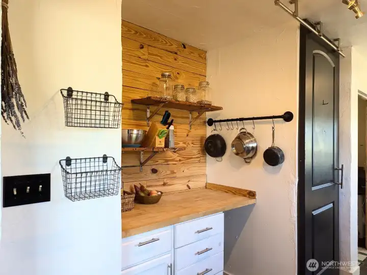 Butcher block prep area and great storage.