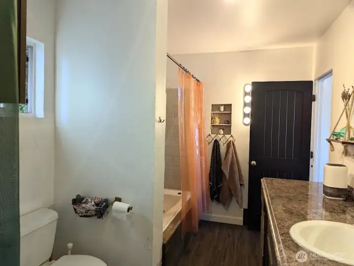 Large spacious bath with storage. W/D moved up from basement, could be additional bath built.