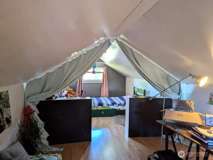 Primary bedroom expands full length of home.