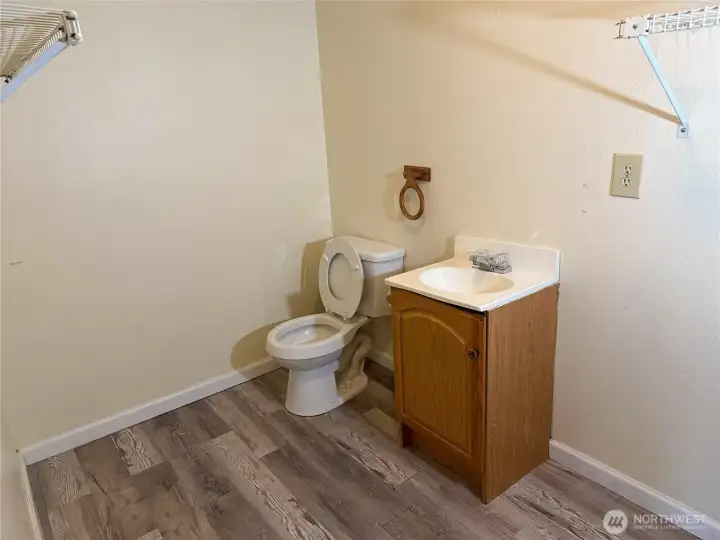 .50 Bathroom in laundry room.