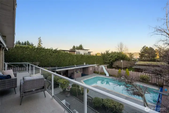 Deck overlooking the pool, patio and cabana