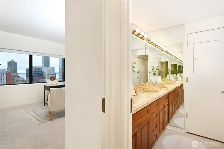 primary bath next to 2 bedrooms