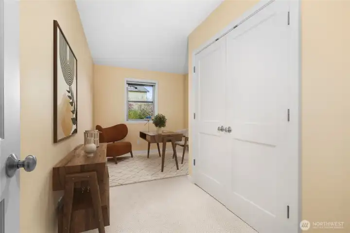 Lower level 3rd bedroom can also be used as a private home office. Virtually staged