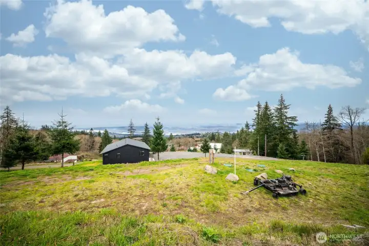 Four bedroom septic, shared well, power, all ready to connect to from the building site!