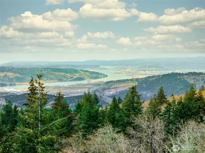 View to the north from a drone shows the potential to expand your river view with a second story plan.