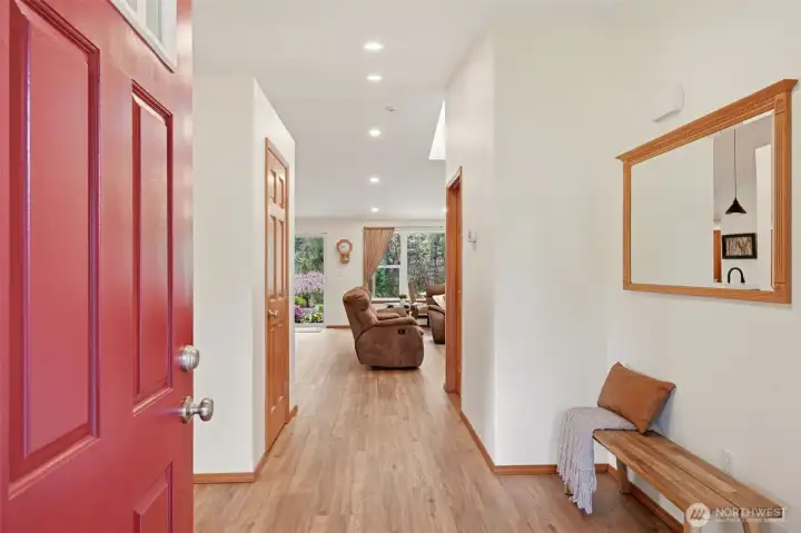 Front Entry opening to Open Concept with Vaulted Ceilings