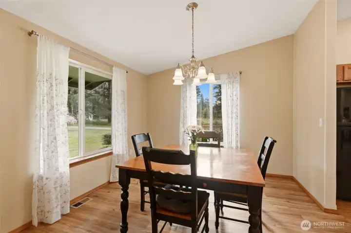 Dining Room of Kitchen with a Peekaboo View of Mt Rainier from the window.