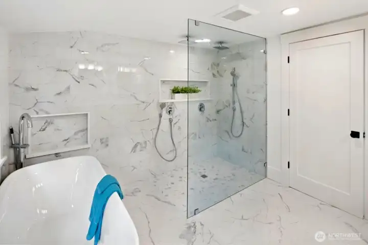 A master bathroom fit for a king! Giant walk in, glass enclosed shoer