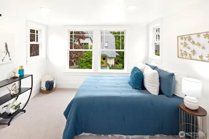 Upstairs guest bedroom 1 with small walk in closet
