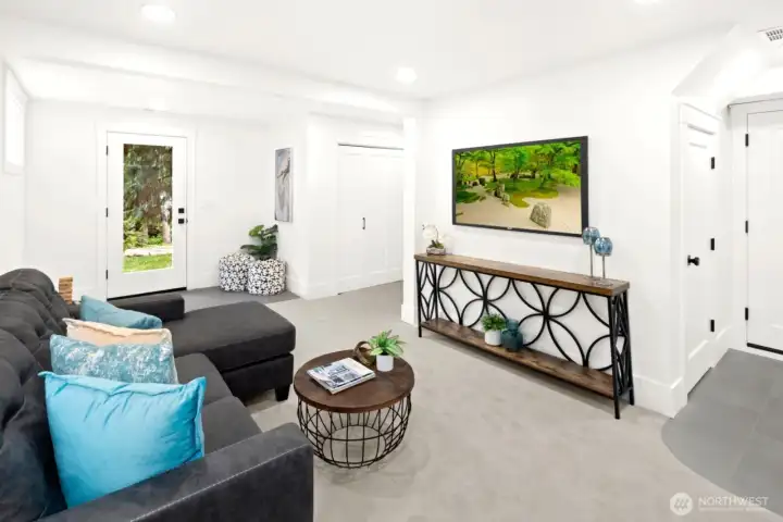 Lower level family room with separate entrance- ADU or Mother in law suite?