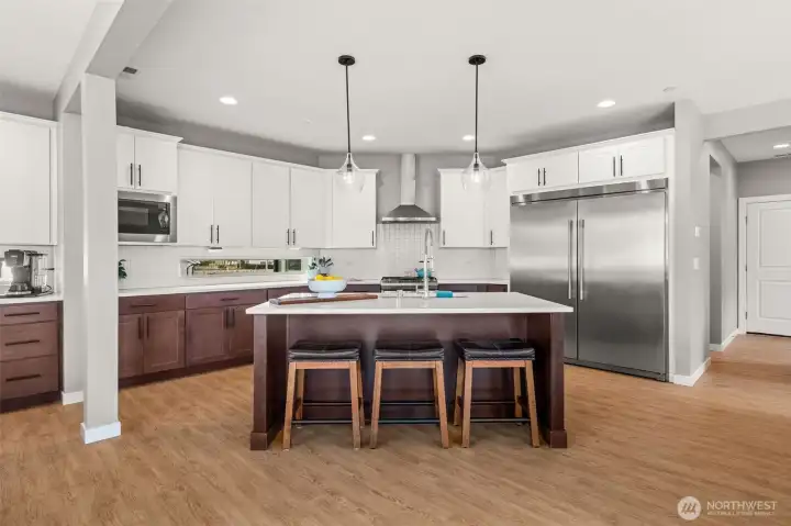 Find comfort in knowing there's extra eating space at this kitchen's breakfast bar.
