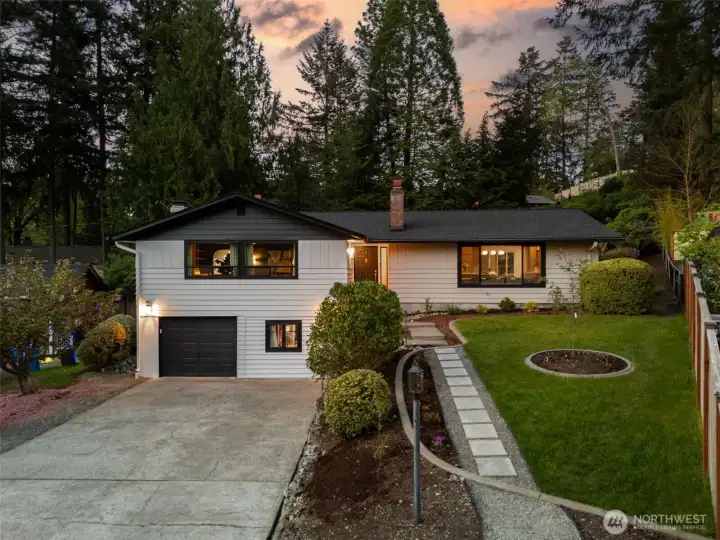 This home welcomes you from the curb. This restored classic will wow you as soon as you step inside.