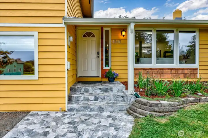 Slate entry adds an elevated vibe.