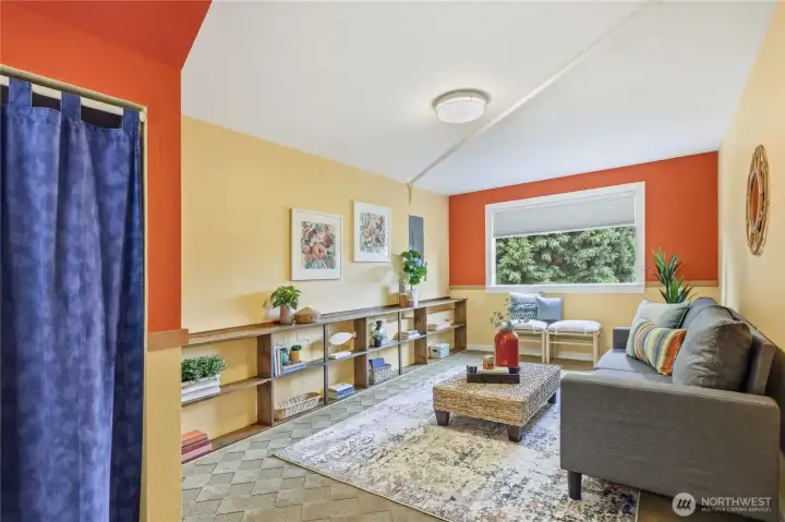 This extra living room is a great tv, music or play room.