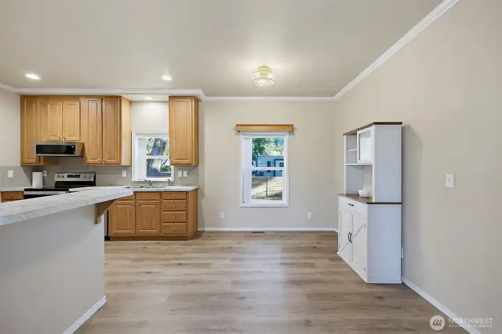 Great Dining Space + Barstool Area.