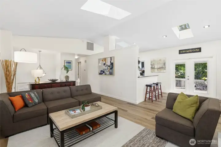 The open-concept layout creates an ideal space for entertaining, allowing guests to comfortably gather and flow throughout the living areas with ease. The open-concept layout creates an ideal space for entertaining, allowing guests to comfortably gather and flow throughout the living areas with ease.