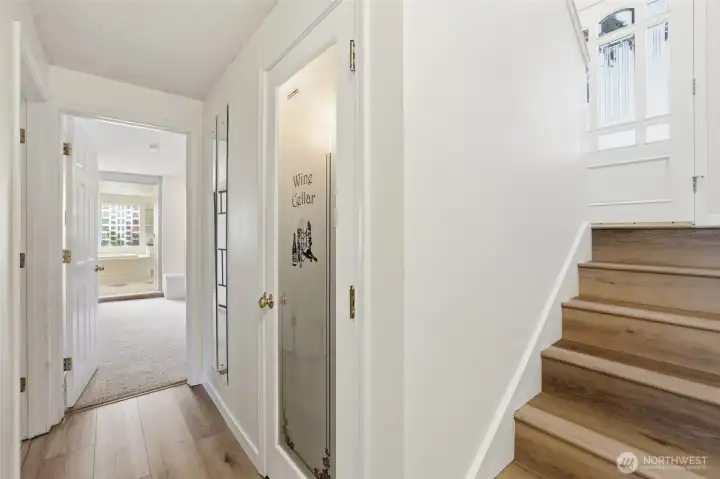 The lower level features a charming wine cellar/closet, perfect for keeping your favorite bottles stored and naturally cool for easy enjoyment and entertaining. The lower level features a charming wine cellar/closet, perfect for keeping your favorite bottles stored and naturally cool for easy enjoyment and entertaining.