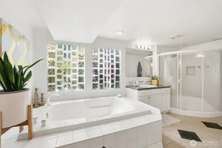 Unwind in the jetted tub in the primary bath and let the stress of the day melt away. Dual vanities provide both convenience and functionality, making busy mornings easy for couples sharing the space. Unwind in the jetted tub in the primary bath and let the stress of the day melt away. Dual vanities provide both convenience and functionality, making busy mornings easy for couples sharing the space.