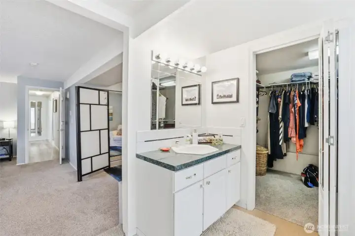 A second vanity conveniently located next to the spacious walk-in closet and just off the primary bath adds extra functionality and a dedicated space for getting ready each day. A second vanity conveniently located next to the spacious walk-in closet and just off the primary bath adds extra functionality and a dedicated space for getting ready each day.