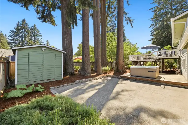 Even with the abundance of storage space in the garage, this charming backyard shed provides the perfect additional spot for tools, gardening supplies, and outdoor equipment. Even with the abundance of storage space in the garage, this charming backyard shed provides the perfect additional spot for tools, gardening supplies, and outdoor equipment.