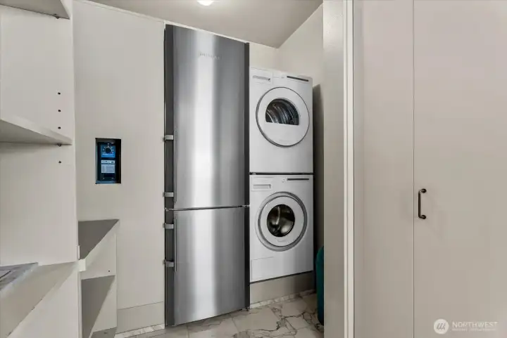 Dedicated utility room with additional storage and in-home laundry area. Dedicated utility room with additional storage and in-home laundry area.