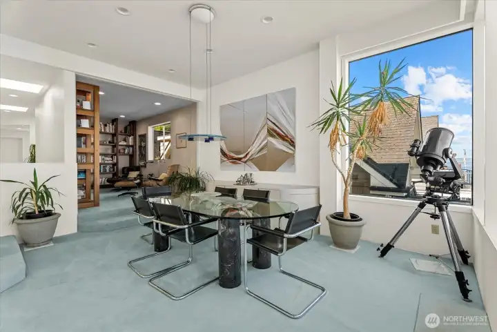 Dining area connects seamlessly to adjacent living spaces, creating flexibility for gatherings large and small. Dining area connects seamlessly to adjacent living spaces, creating flexibility for gatherings large and small.
