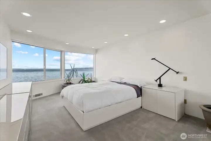 Primary suite positioned to capture stunning Puget Sound views and natural light. Primary suite positioned to capture stunning Puget Sound views and natural light.