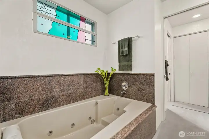 Jetted soaking tub offers a relaxing retreat within the primary suite. Jetted soaking tub offers a relaxing retreat within the primary suite.
