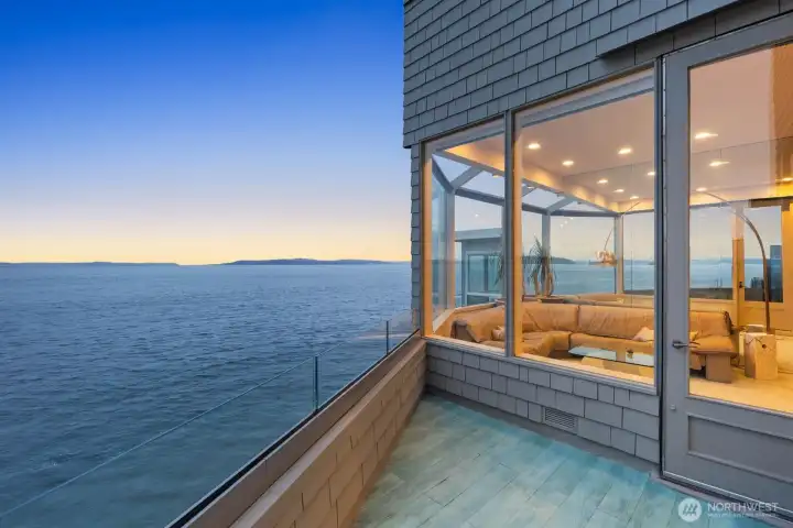 Waterfront sunsets and evening views from the private deck. Waterfront sunsets and evening views from the private deck.