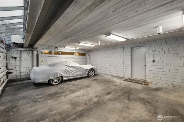 Secure garage parking with additional storage potential. Secure garage parking with additional storage potential.