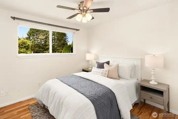 Primary bedroom with ceiling fan