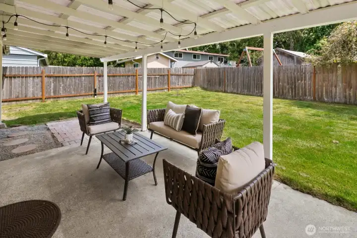 Enjoy meals on the patio, through the sliding glass doors