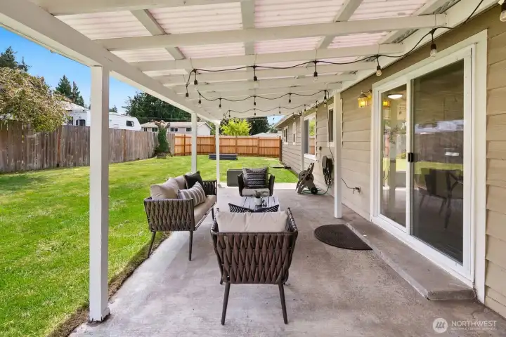 Relax on the patio in your huge backyard