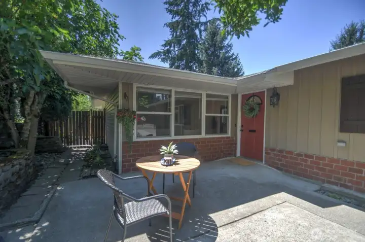 Feel the charm of this 1964 Eastside home even before you enter the front door! The lovely front patio area is the perfect spot for al fresco relaxation with a cup of coffee or afternoon drink.