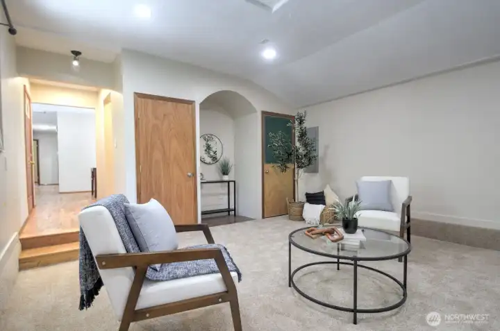 This room is large enough to accommodate a number of uses - work, play, lounging, media...it's up to you!