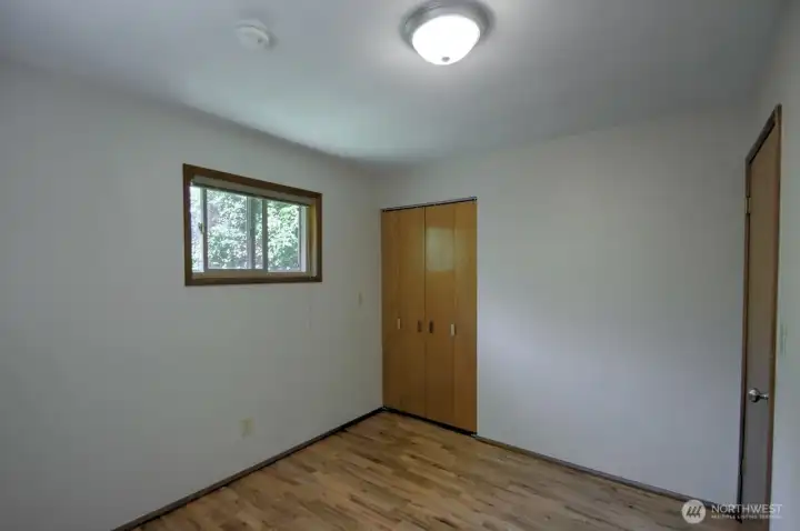Bedroom #2 with vintage closet door detail