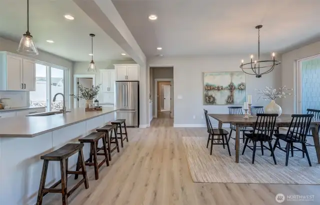 Lovely flow between kitchen, family and dining..